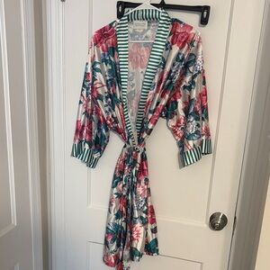 Woman Within Floral Kimono with Striped Accents